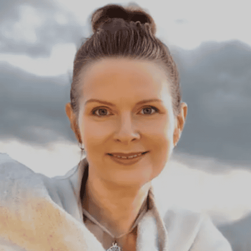 Serene woman enjoying peaceful sound healing at New Living Expo.